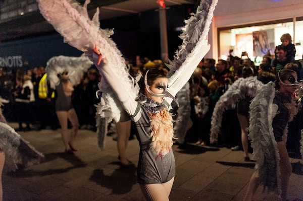 Women in bird costumes for Halloween in Malaga