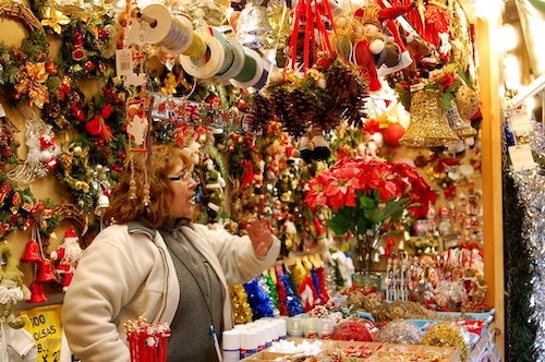 Female vendor in Christmas Marketplace in Barcelona