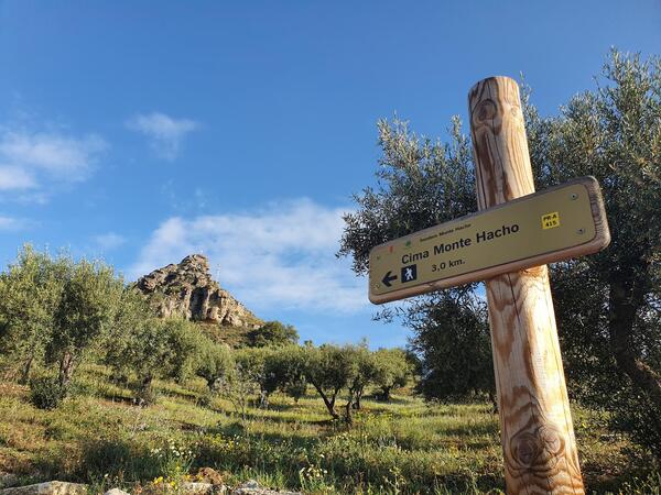 A sign for a nature trail on El Hecho in Ardales