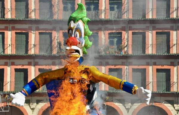 The burning figure of God Momo during a carnival parade in Spain