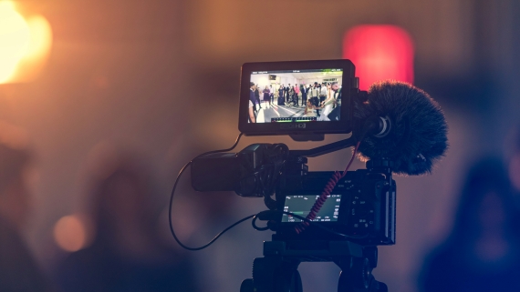 A digital camera filming a scene.