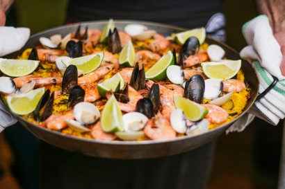 A pan of seafood paella taken in Guatemala, similar to the best seafood paella in Granada, Spain.